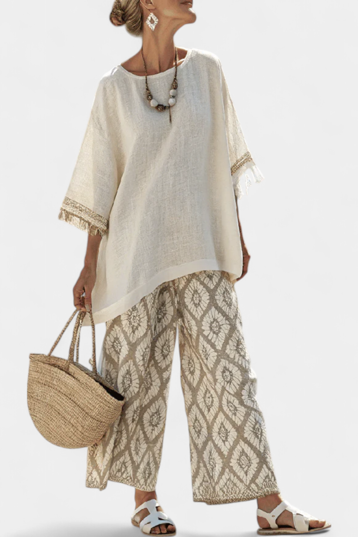 Completo Boho Chic Daisy: Lång Blus och Mönstrade Byxor för en Unik Stil