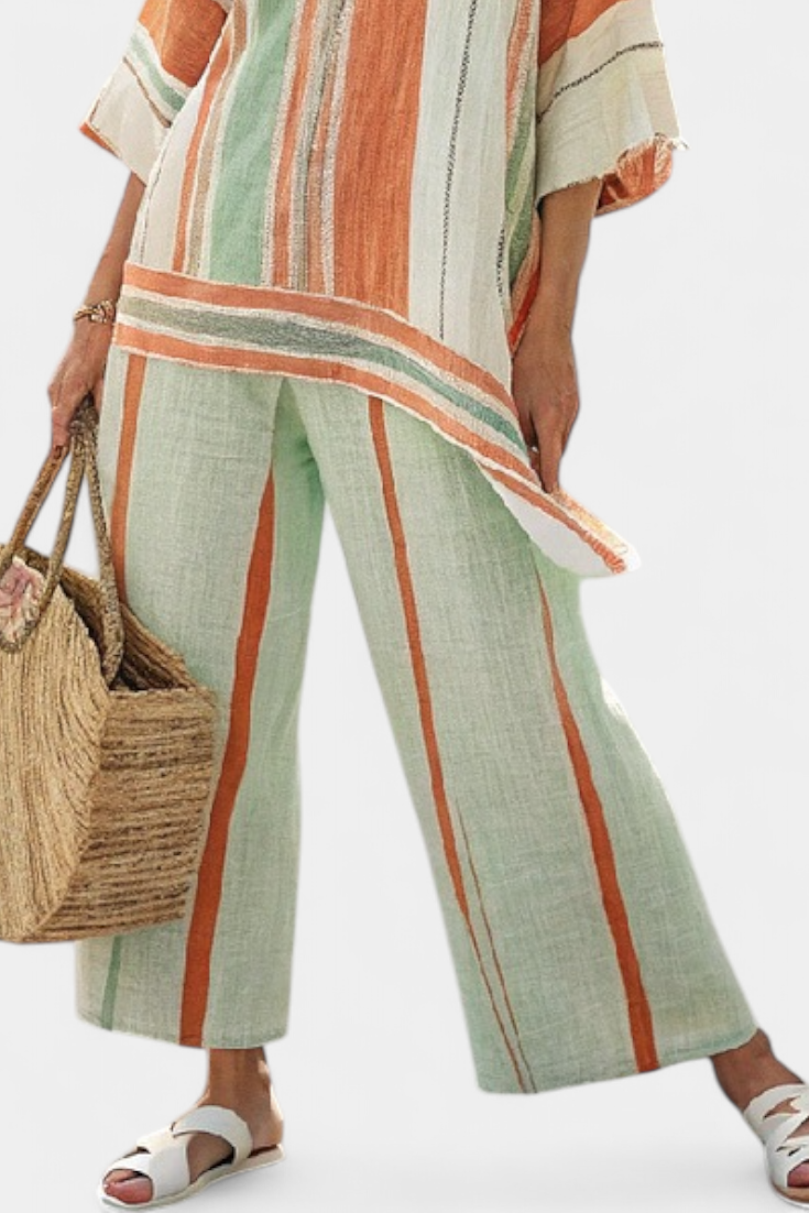 Elegant Set i Bambulinstyg med Asymmetrisk Blus och Vida Byxor för en Raffinerad Stil